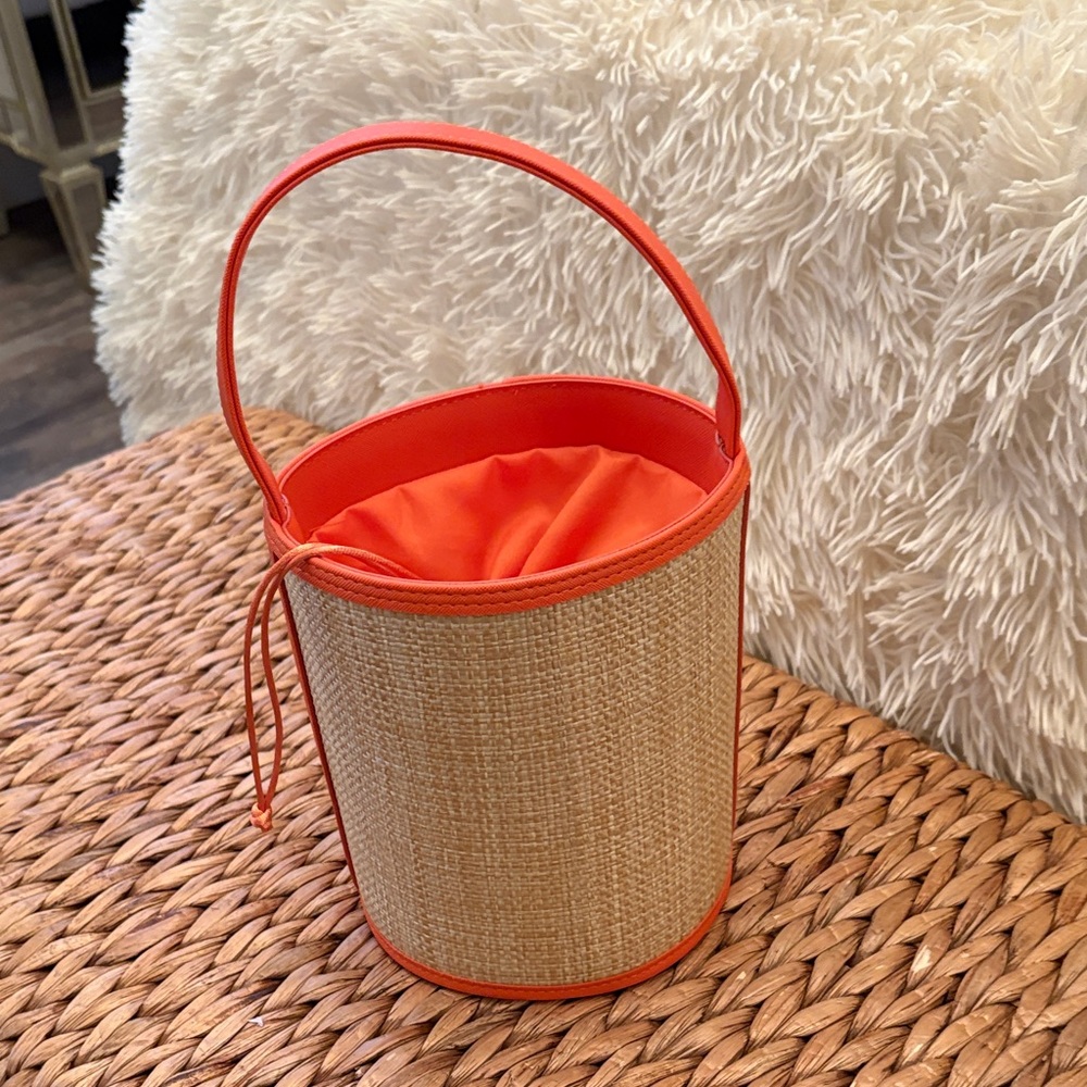 Woven orange bucket bag